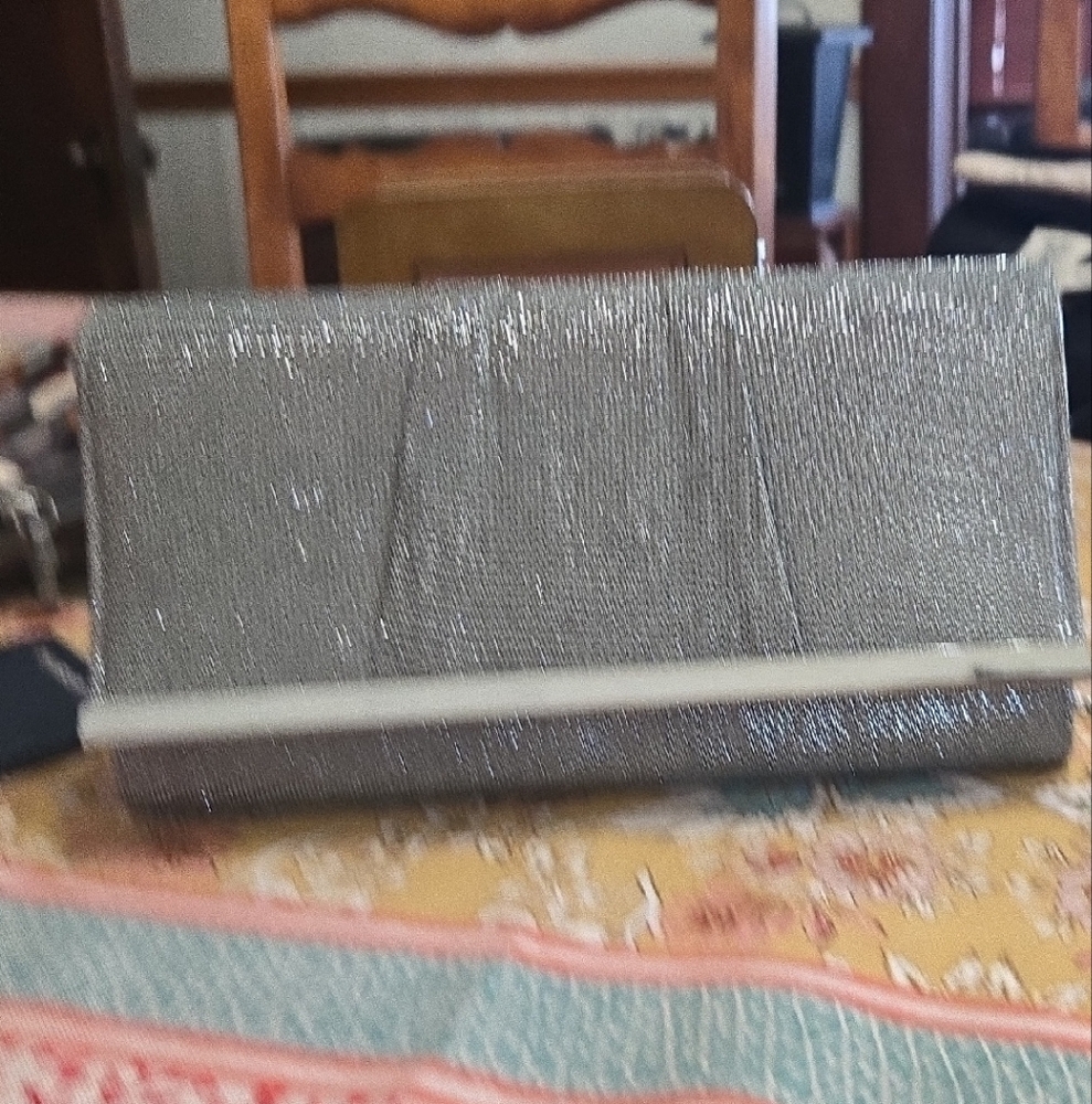 Jessica McClintock Shimmering Silver Clutch